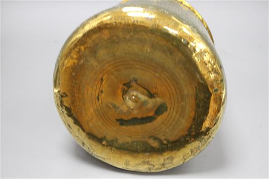 A Cairoware brass jardiniere, decorated with panels of figures and calligraphy, height 18cm, diameter 24cm